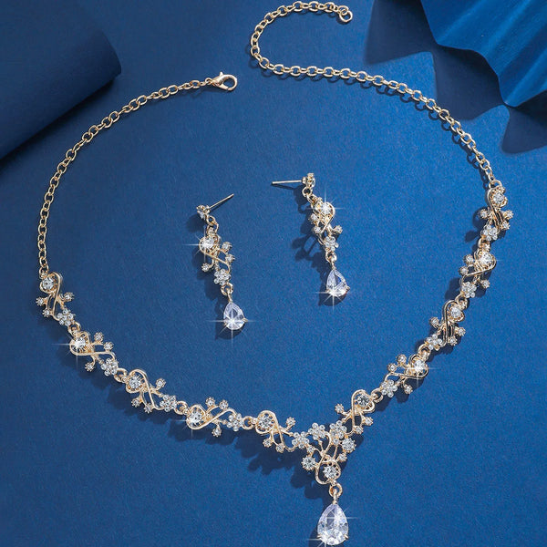 https://ae01.alicdn.com/kf/S2f663768570d4534a8ec1bd5817cdf17U/Gold-Plated-Crystal-Jewelry-Set-for-Women-Bridal-Party-Necklace-Earrings-Set-with-Teardrop-Pendant.jpg