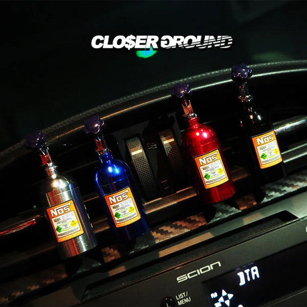 https://ae01.alicdn.com/kf/S4c1be58bc6dc421a9d8372d82200d708x/Hot-Sale-Car-Air-Freshener-NOS-Nitrogen-Bottle-Air-Vent-Aromatherapy-Auto-Aroma-Outle-Perfume-Flavoring.jpg