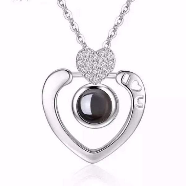 https://ae01.alicdn.com/kf/Sbcbb51a0b9f6406e997de932f114094bl/Projection-Necklace-100-Languages-I-Love-You-Pendant-Jewelry-For-Girlfriend-Wife-Lover-Couple-Creative-Romantic.jpg