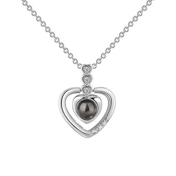 https://ae01.alicdn.com/kf/S9727fde9fc6749b9b74082148f6706e9V/Projection-Necklace-100-Languages-I-Love-You-Pendant-Jewelry-For-Girlfriend-Wife-Lover-Couple-Creative-Romantic.jpg