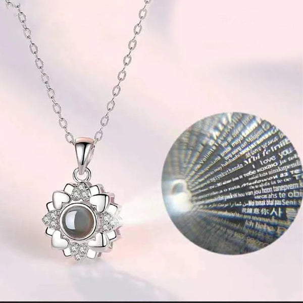 https://ae01.alicdn.com/kf/S183ac30f50534b57878c314b8649d78au/Projection-Necklace-100-Languages-I-Love-You-Pendant-Jewelry-For-Girlfriend-Wife-Lover-Couple-Creative-Romantic.jpg